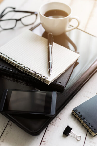 Tax Accountant notebook with laptop and cup of coffee on wooden d 2025 03 05 01 41 30 utc